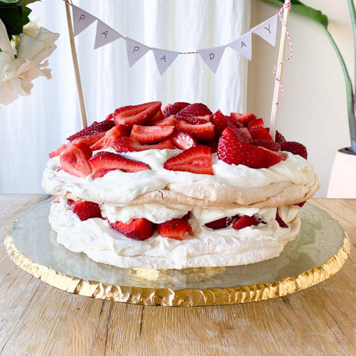 Edgey Cake Pedestal stand with a Pavlova cake